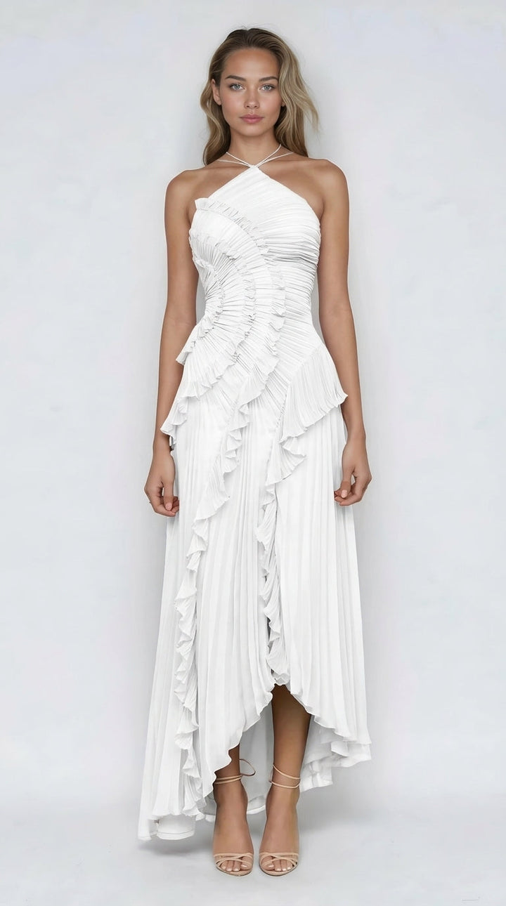 Vestido rosa con volantes de Veska, edición limitada, diseñado para ocasiones especiales, con detalles elegantes y estilo exclusivo.